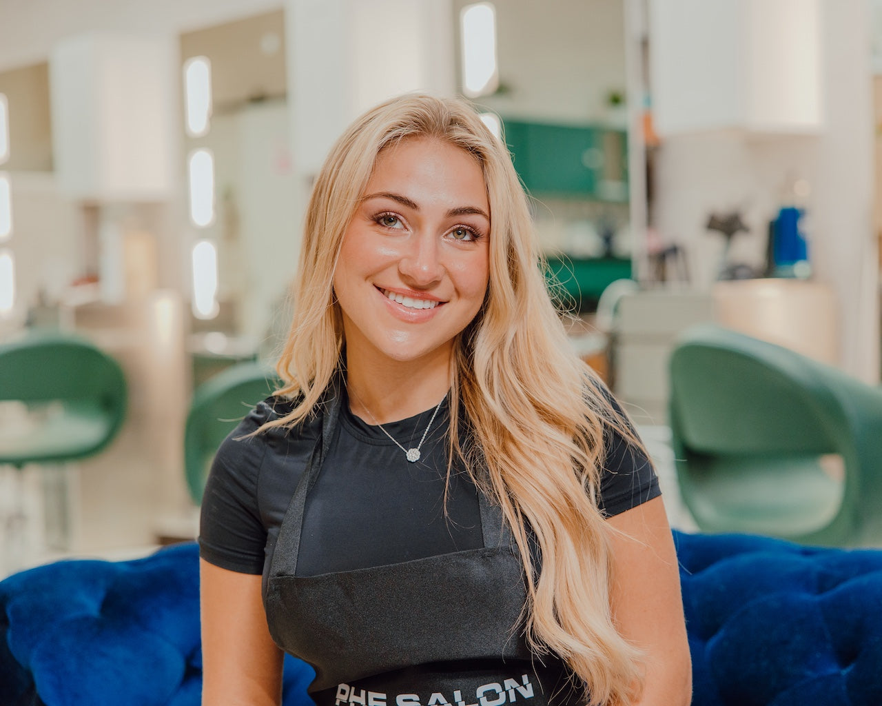 Savannah Cole, master stylist and gray blending specialist at PHE Salon Jupiter
